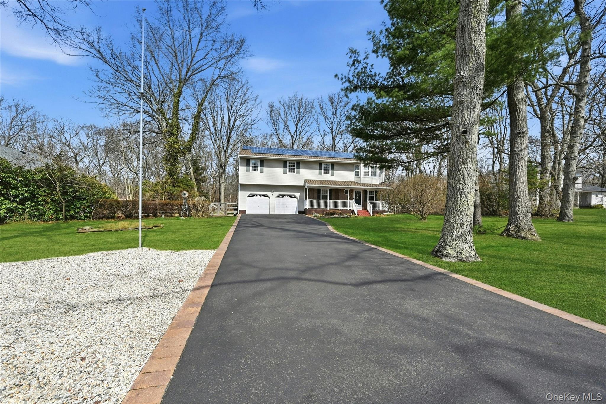 41 North Country Road Shoreham, NY 11786 - Photo 27 of 31 Driveway with space to turn the car around