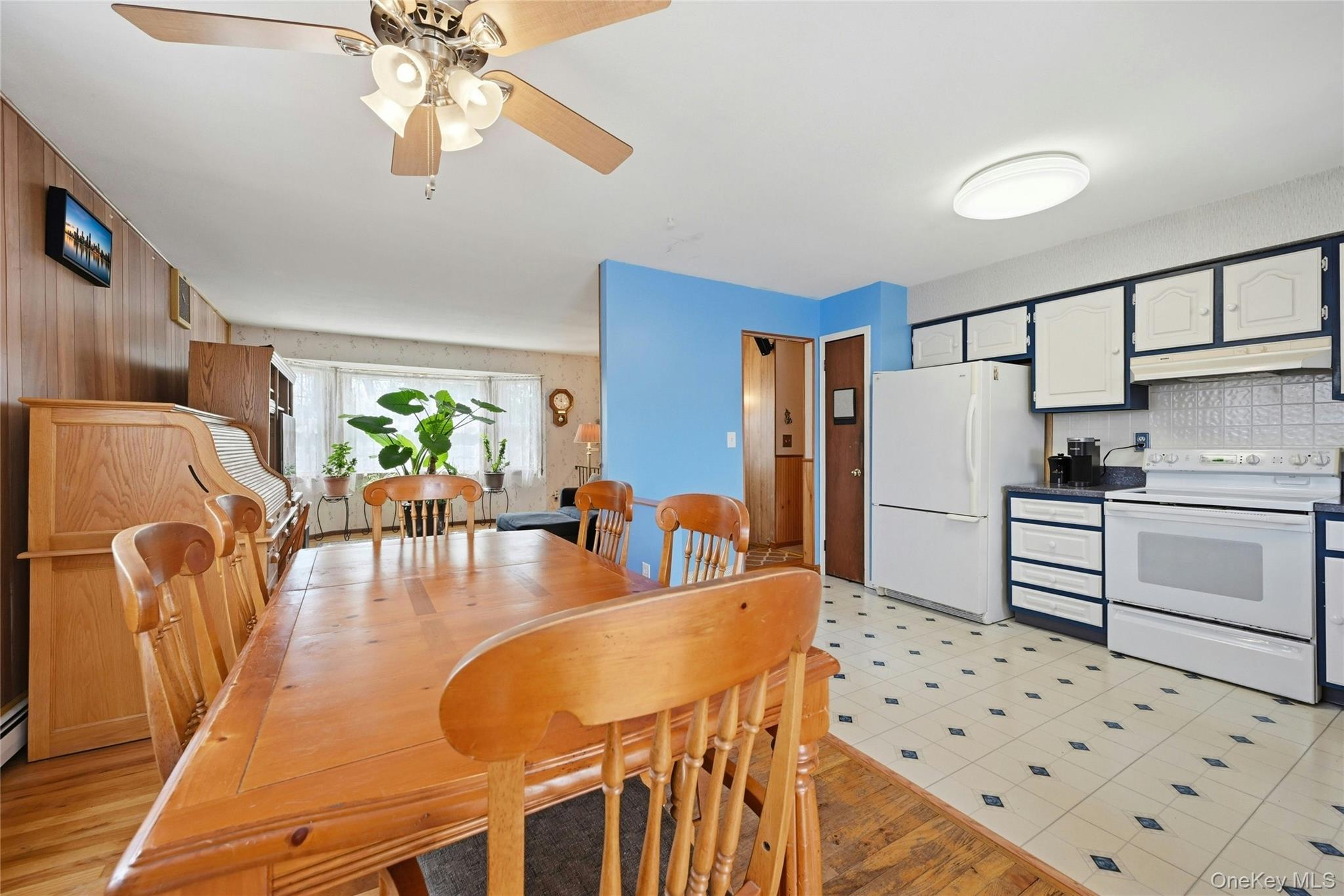 41 North Country Road Shoreham, NY 11786 - Photo 9 of 31 view from back door towards the kitchen and dining area