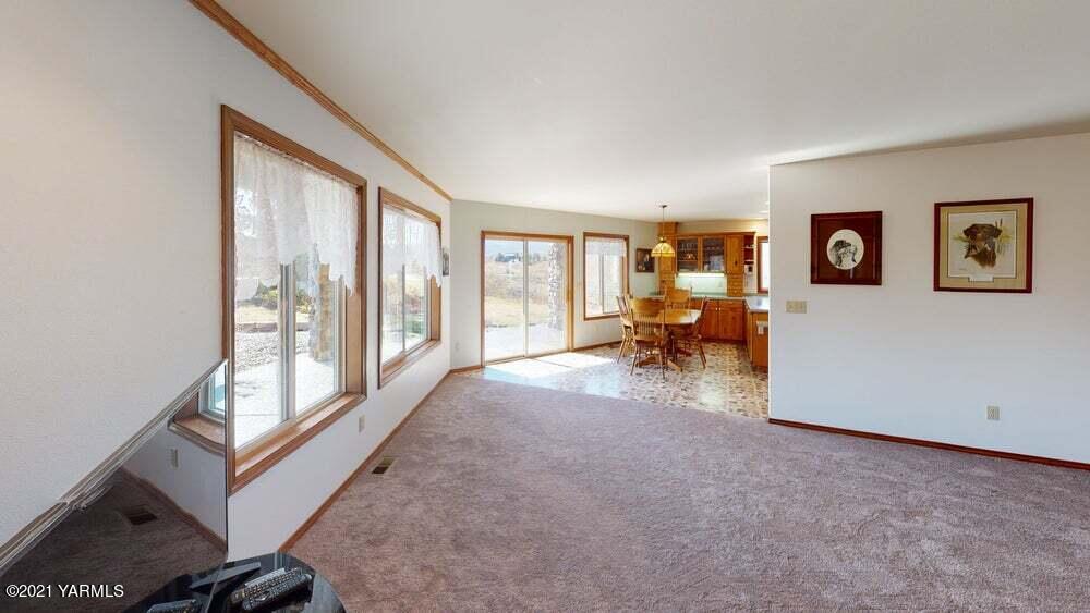 301 Red Tail Road Yakima, WA 98908 - Photo 13 of 52 a view of living room with furniture and large window