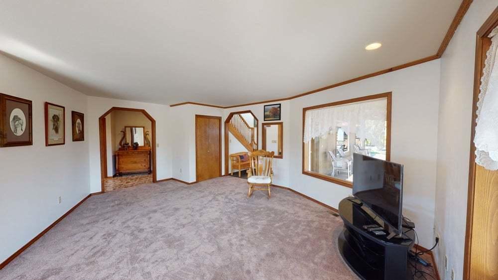 301 Red Tail Road Yakima, WA 98908 - Photo 14 of 52 a view of an empty room with glass door and a window