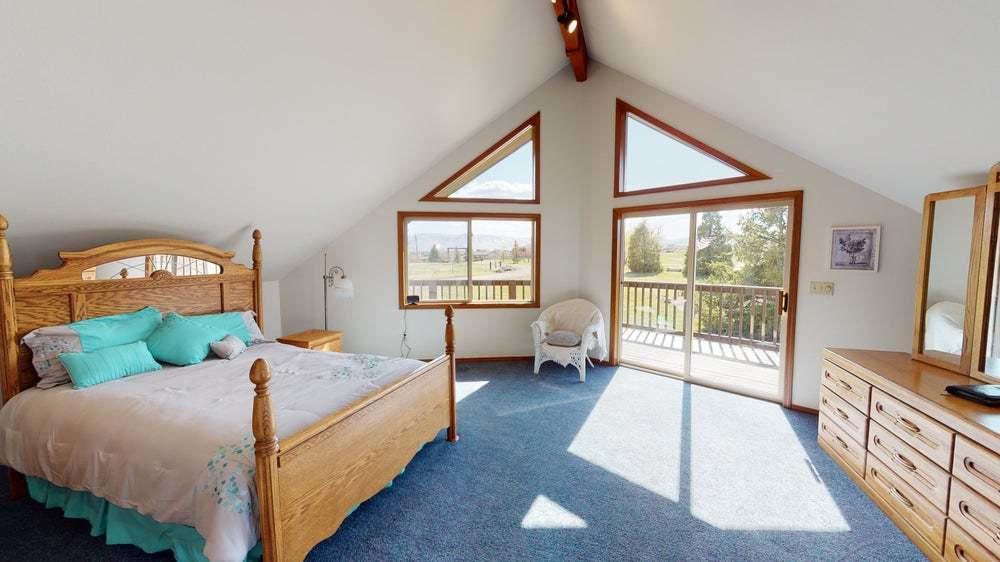 301 Red Tail Road Yakima, WA 98908 - Photo 20 of 52 a bed room with a bed and a television