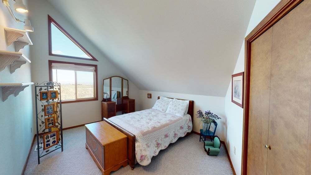 301 Red Tail Road Yakima, WA 98908 - Photo 23 of 52 a bedroom with a bed and a window