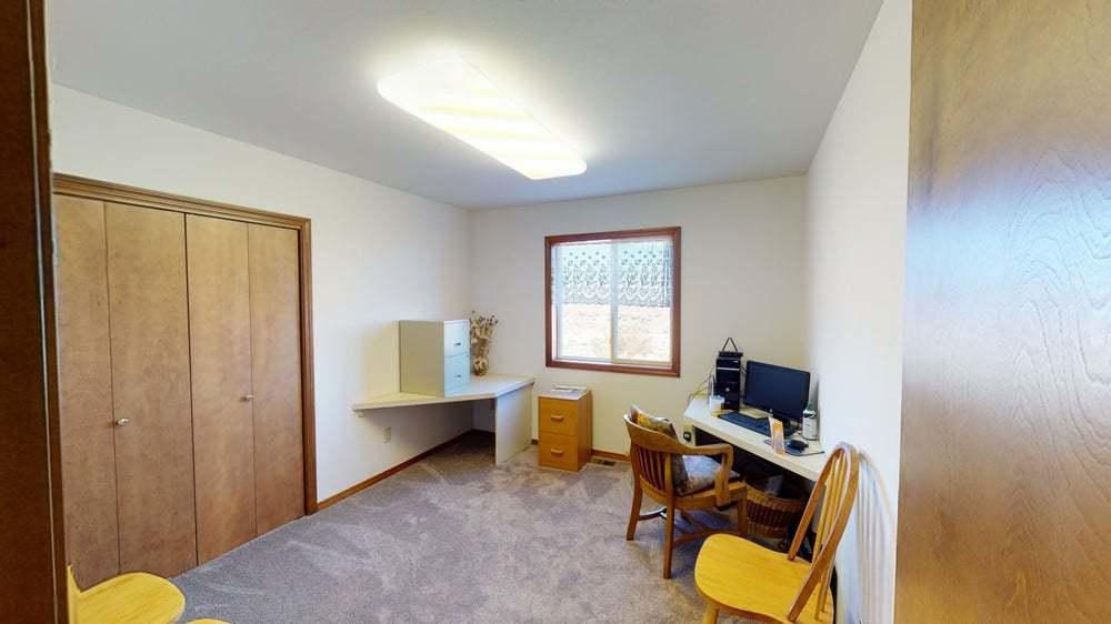 301 Red Tail Road Yakima, WA 98908 - Photo 27 of 52 a view of a workspace with furniture and a window