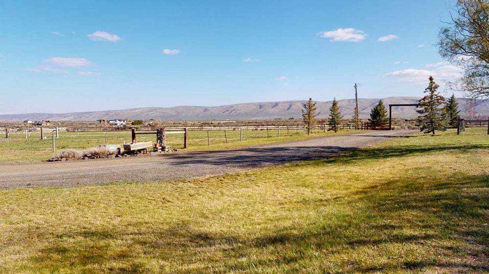 301 Red Tail Road Yakima, WA 98908 - Photo 32 of 52 a view of a lake with a mountain