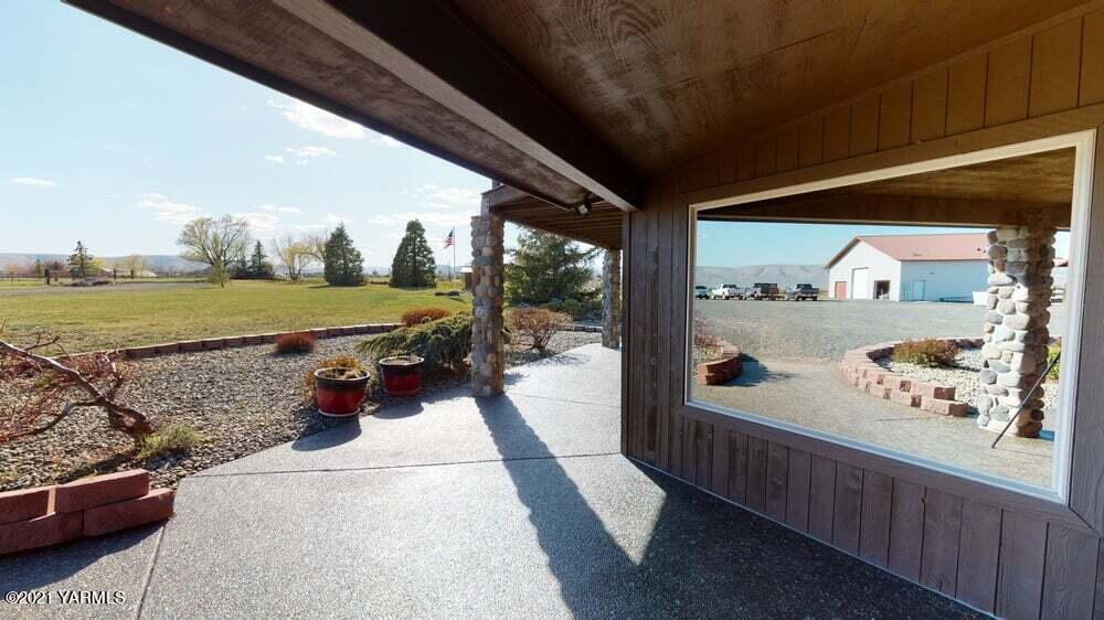 301 Red Tail Road Yakima, WA 98908 - Photo 36 of 52 a view of a porch with furniture and front door