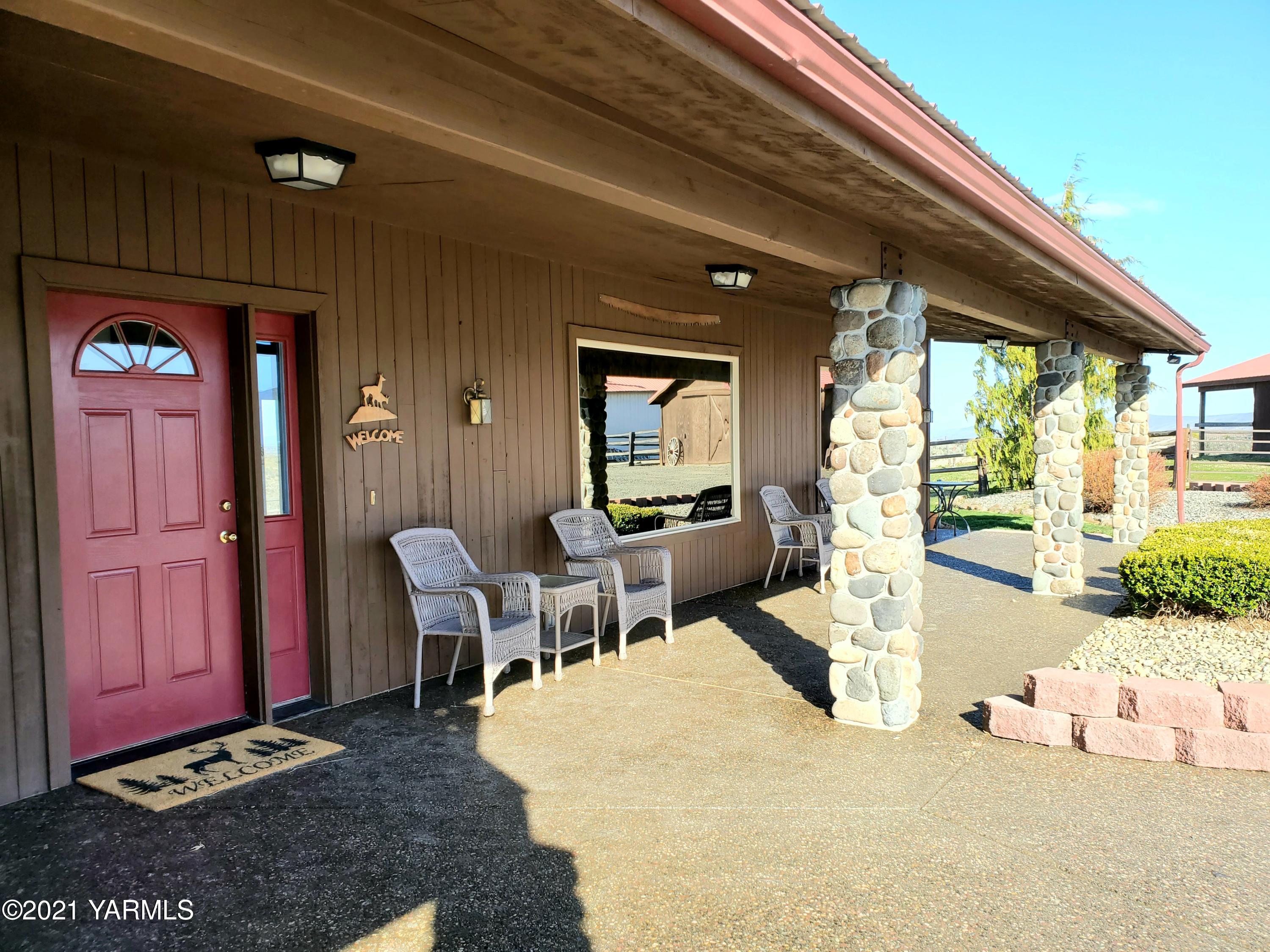 301 Red Tail Road Yakima, WA 98908 - Photo 5 of 52 a view of a dining room with furniture window and wooden floor