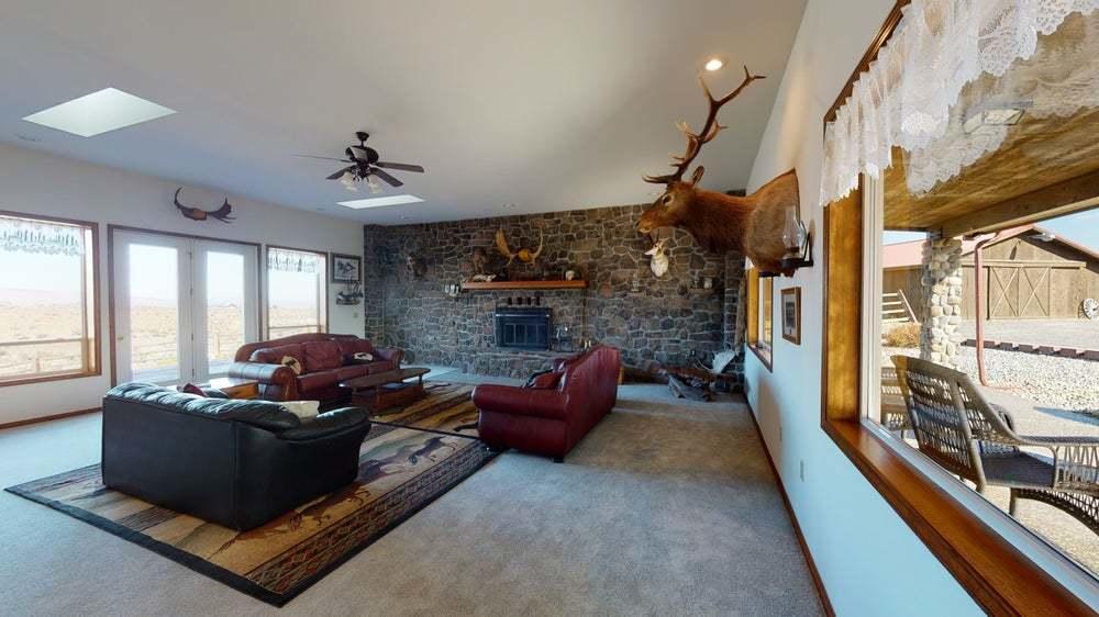 301 Red Tail Road Yakima, WA 98908 - Photo 8 of 52 a living room with furniture and a fireplace