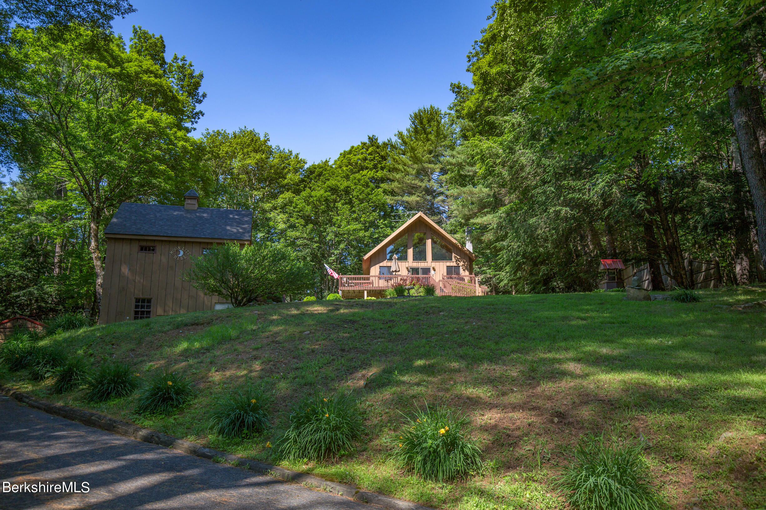 257 West Center Road Otis, MA 01253 - Photo 3 of 44 a view of a house with a yard and sitting area