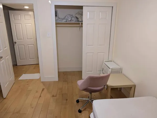a workspace with furniture and wooden floor