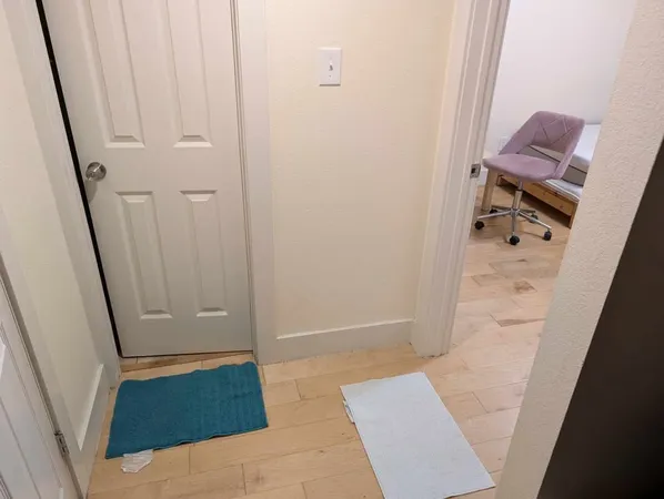 a lobby with furniture and a table