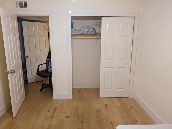 a bathroom with a toilet and a sink