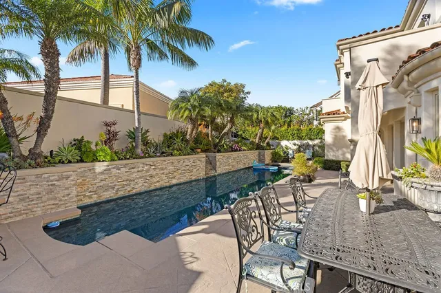 a outdoor living space with patio furniture and a potted plant