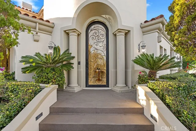 a outdoor space with a fireplace and a potted plant
