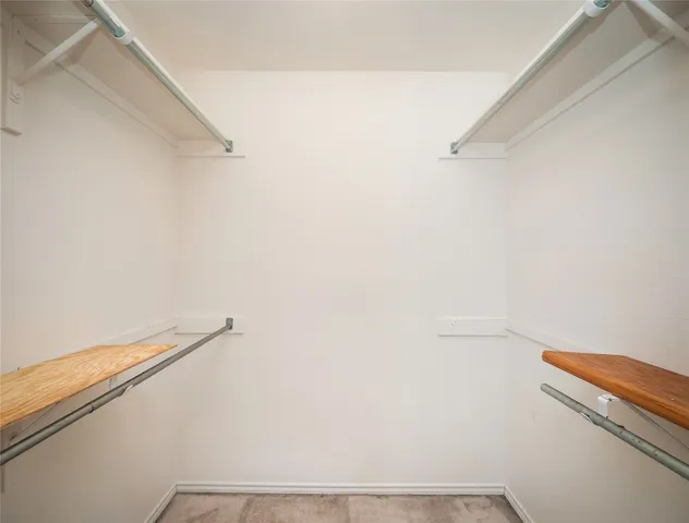 a view of a room with racks on the wall