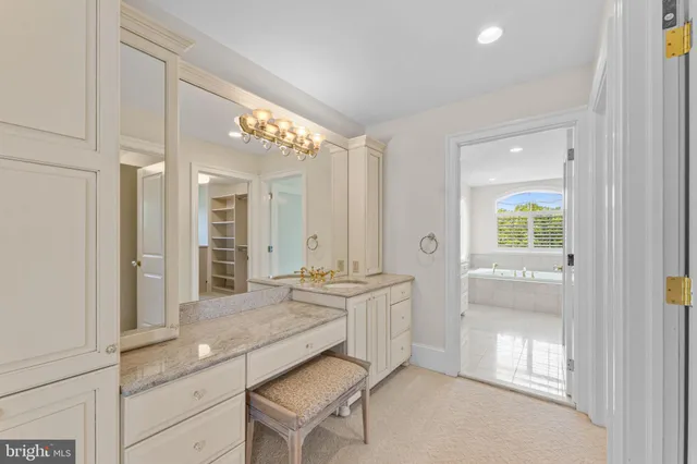 a living room with lots of furniture and a dining table