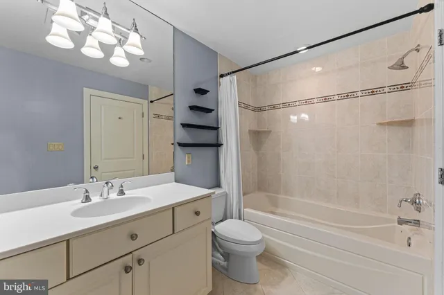 a utility room with a sink dryer and washer