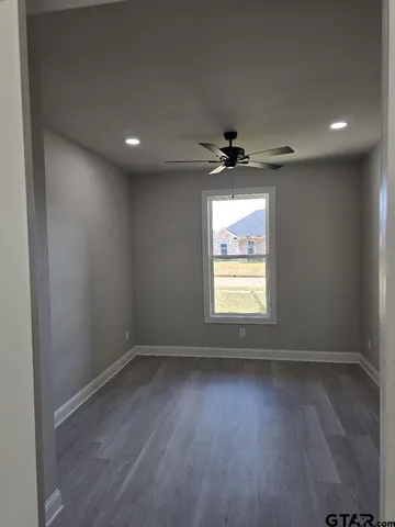 a view of an empty room and window