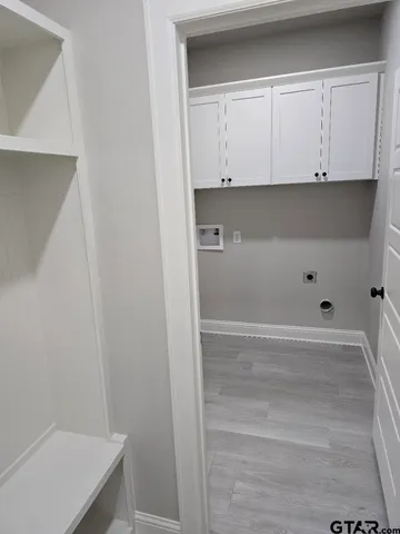 a view of an empty walk in closet