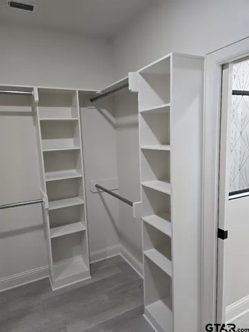 a view of small space with wooden floor