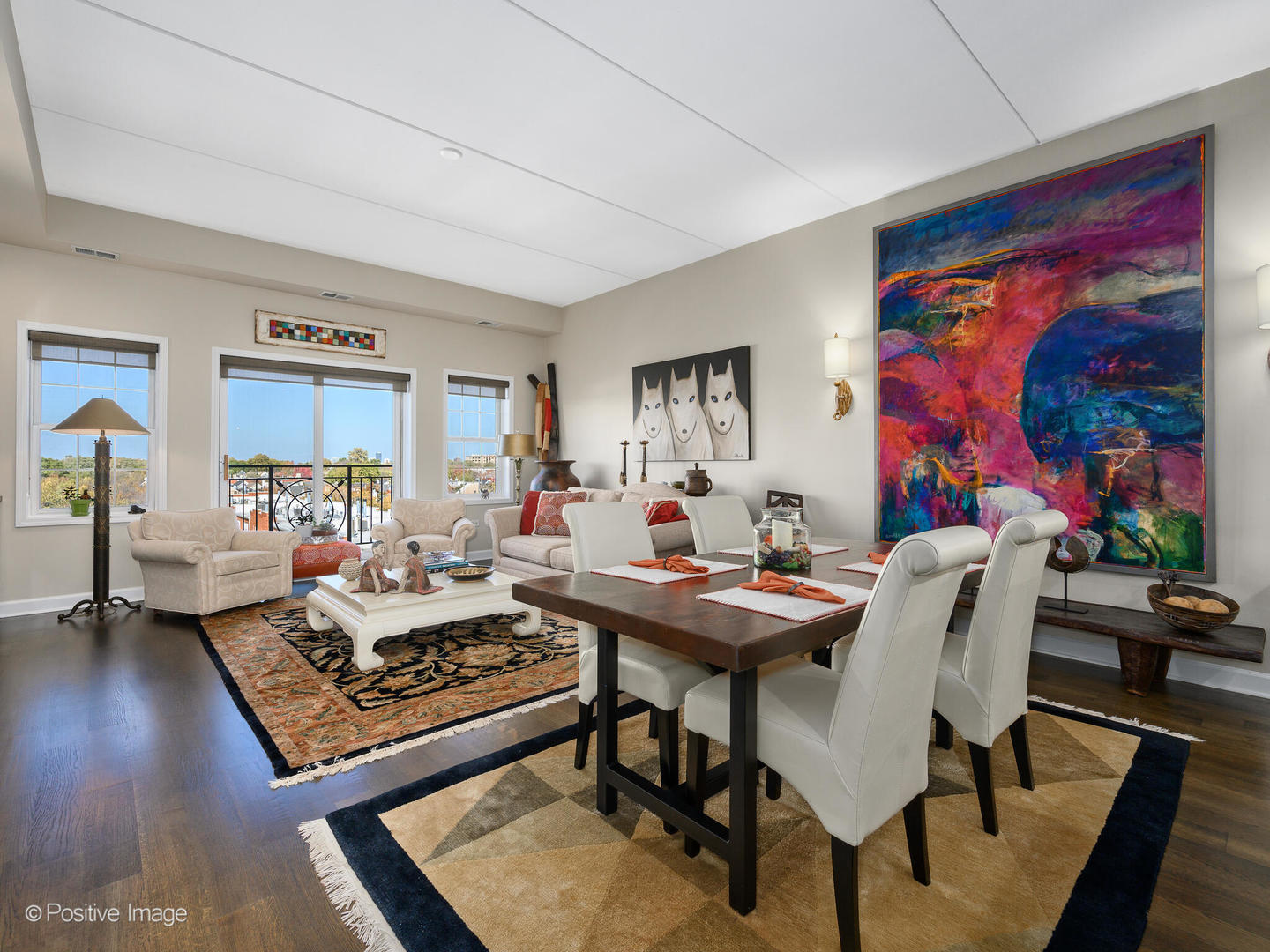 1909 West Diversey Parkway, Unit 501 Chicago, IL 60614 - Photo 3 of 21 a living room with furniture and wooden floor