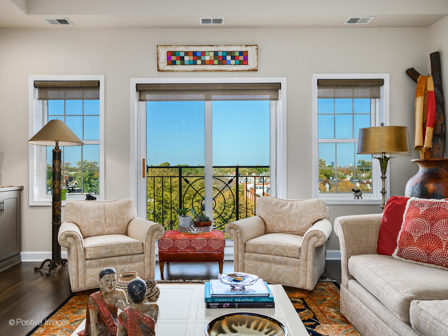 1909 West Diversey Parkway, Unit 501 Chicago, IL 60614 - Photo 5 of 21 a living room with furniture and a lamp