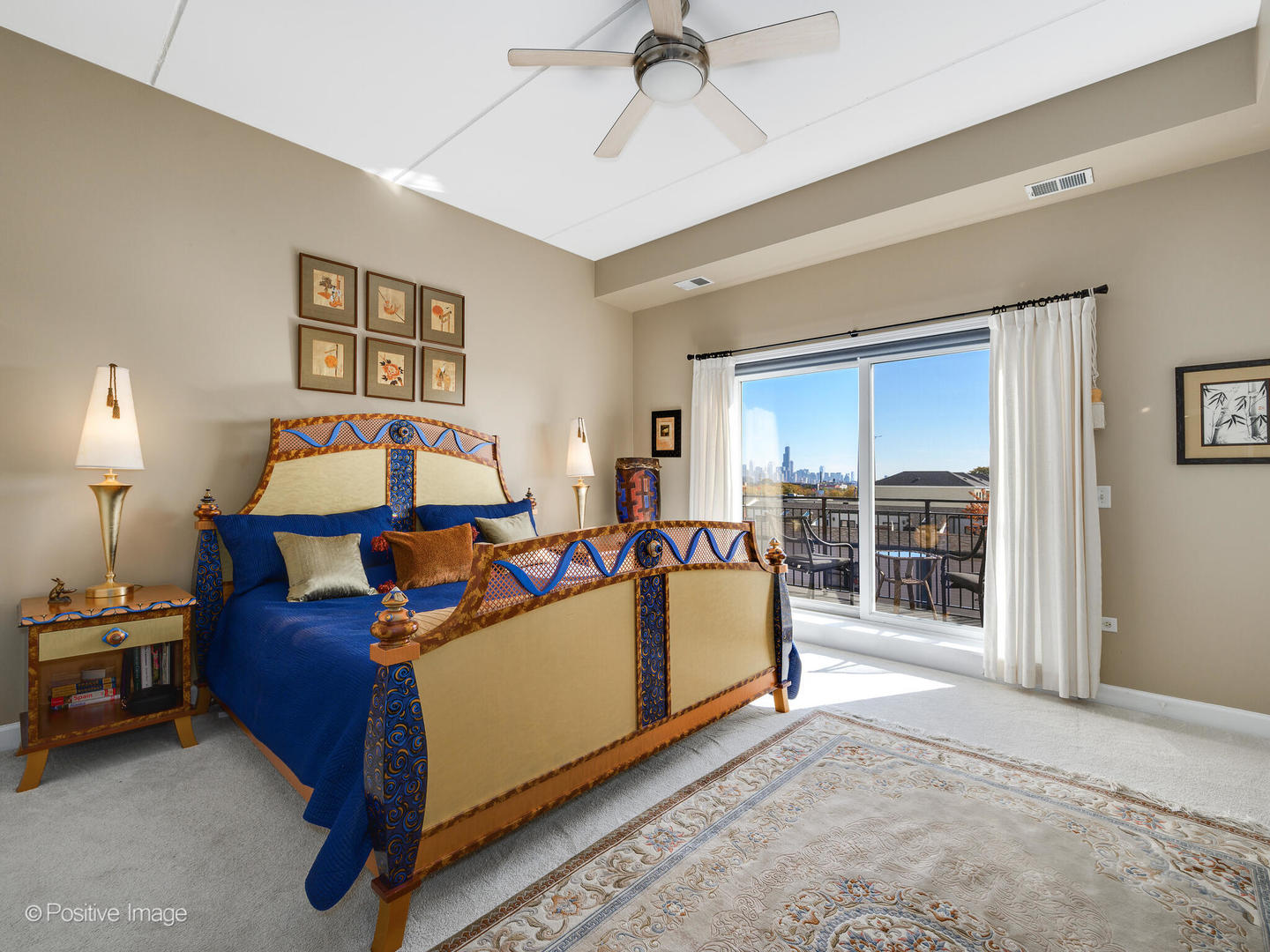 1909 West Diversey Parkway, Unit 501 Chicago, IL 60614 - Photo 10 of 21 a bed room with a bed and a lamp