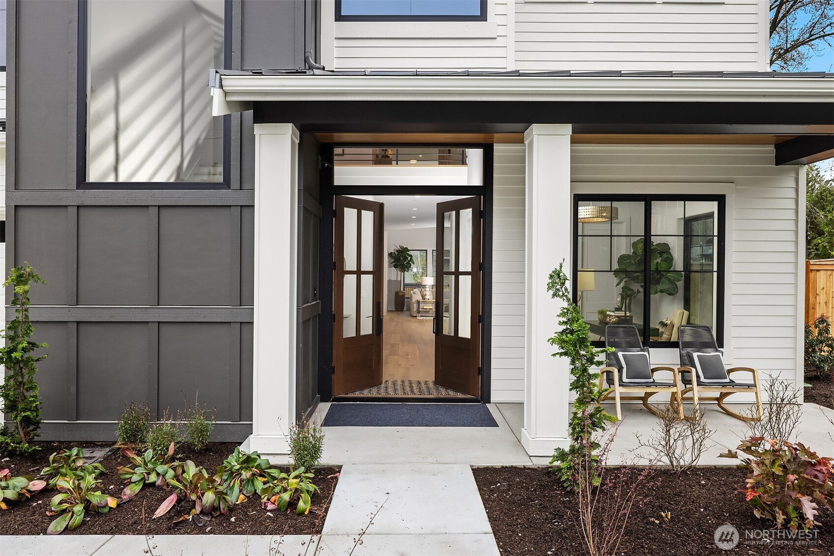 a front view of a house with a porch