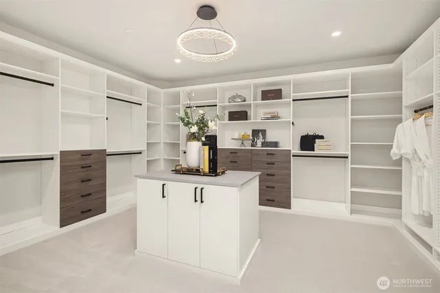 a kitchen with cabinets and window