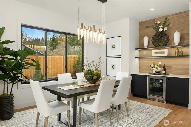 a view of a dining room with furniture window and outside view