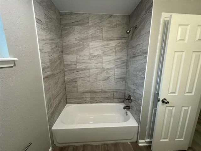 a bathroom with a tub