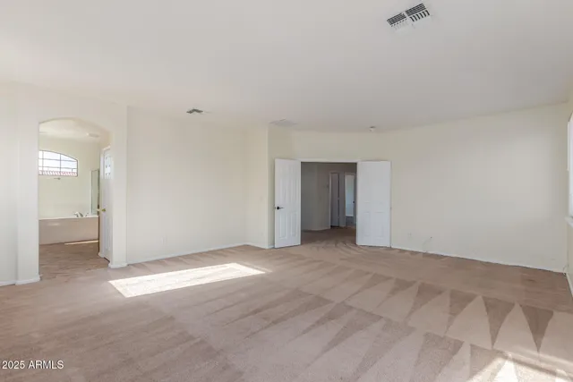 an empty room with an entryway