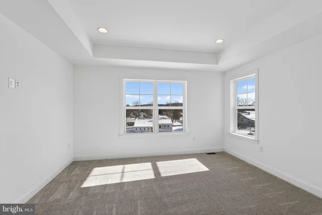 a view of empty room with a window