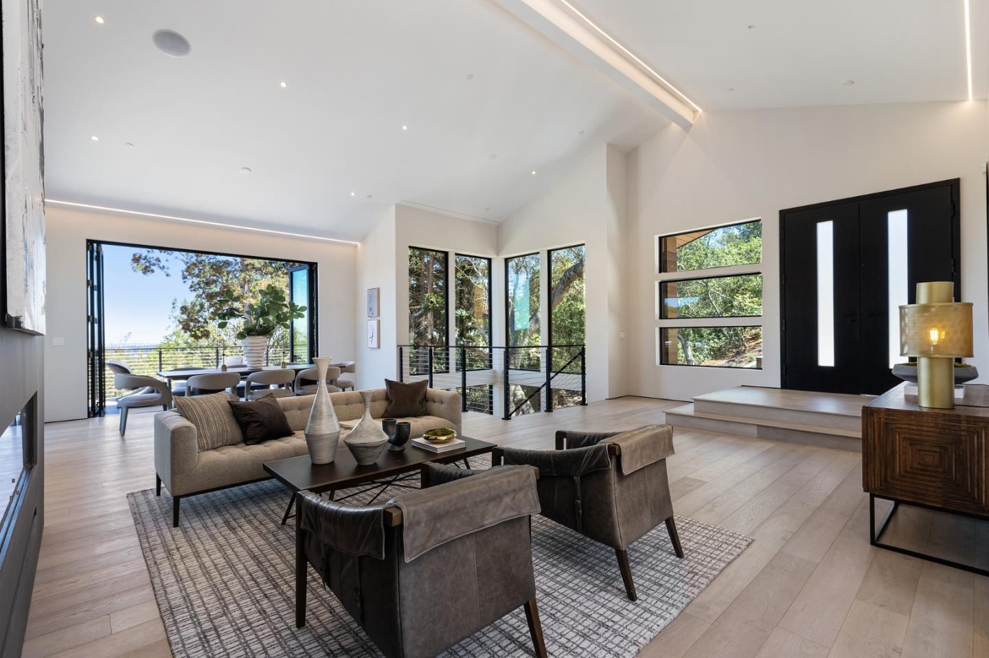 255 Hardwick Road Woodside, CA 94062 - Photo 4 of 90 a living room with furniture and large windows
