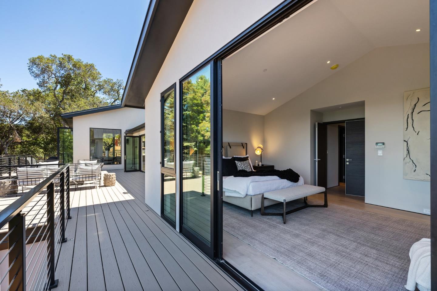 255 Hardwick Road Woodside, CA 94062 - Photo 43 of 90 a outdoor space with furniture and wooden floor