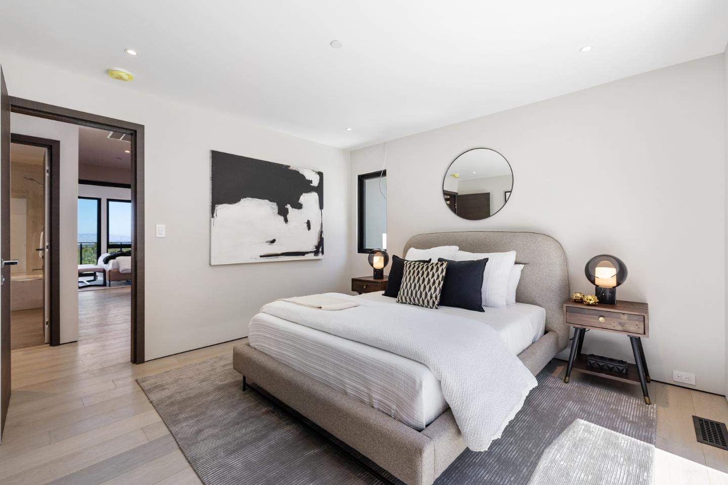 255 Hardwick Road Woodside, CA 94062 - Photo 51 of 90 a bedroom with bed and a painting on the wall