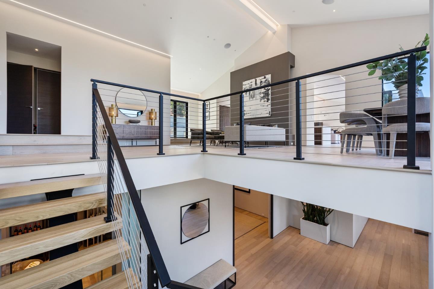 255 Hardwick Road Woodside, CA 94062 - Photo 56 of 90 a hallway with wooden floor and windows
