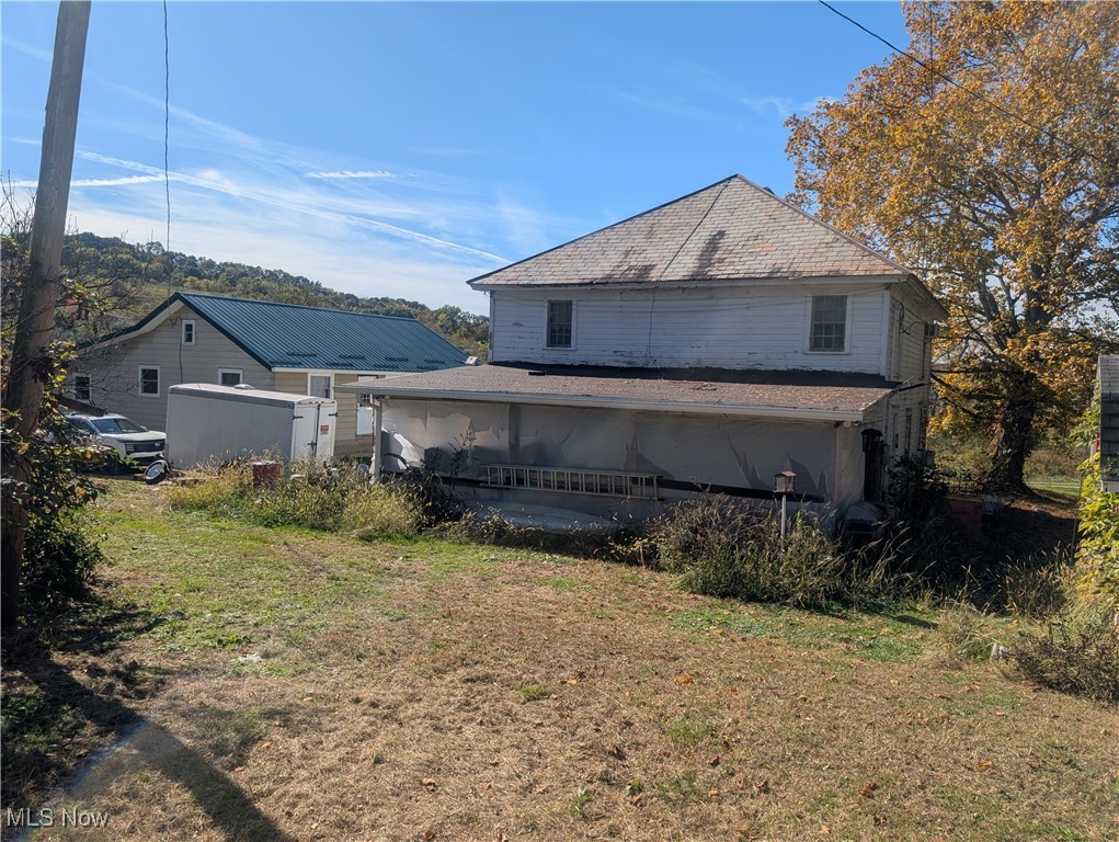 29015 Taylor Road Dennison, OH 44621 - Photo 6 of 50 Back of property with a yard