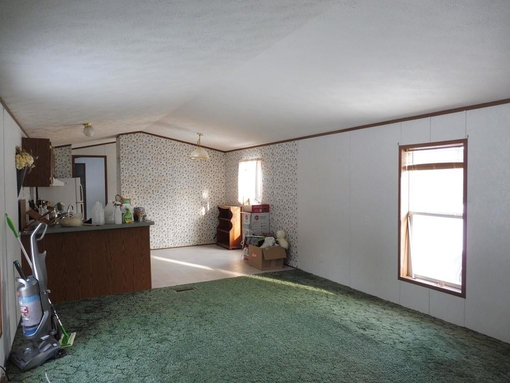 35 Byfield Road Ashburnham, MA 01430 - Photo 12 of 18 a view of a livingroom with furniture and a window