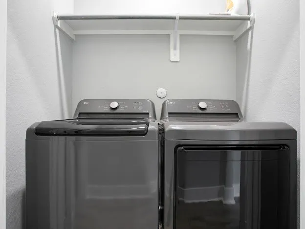 a close up view of washer and dryer