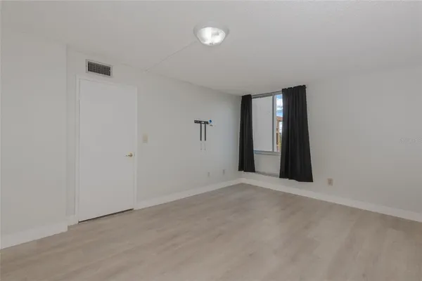 an empty room with an entryway