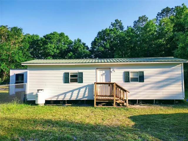 a view of a house with pool