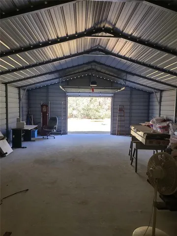 a room with furniture and a window