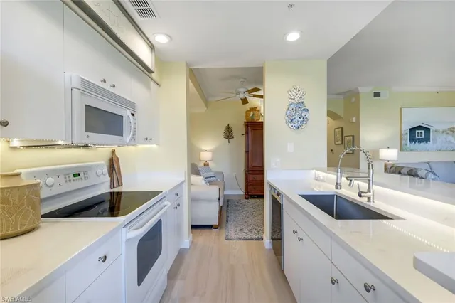 a view of a brick building next to a yard