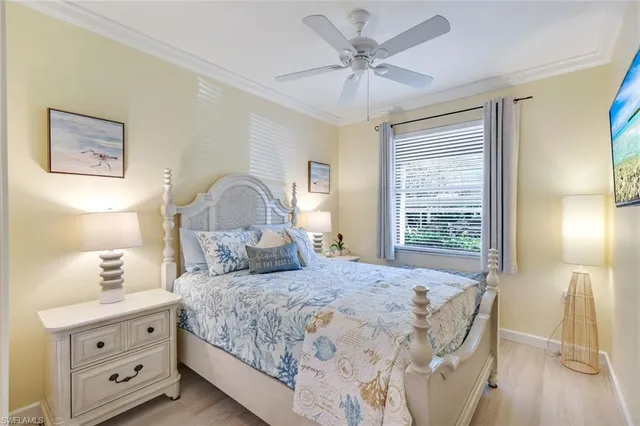 a view of a kitchen area with furniture and wooden floor