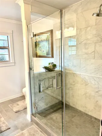 a dining room with granite countertop furniture and a window
