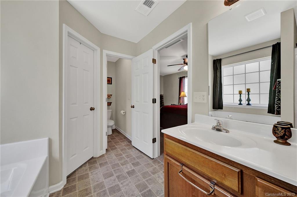 2015 Gunnars Ridge Road, Unit 1/1 Lancaster, SC 29720 - Photo 5 of 19 a spacious bathroom with a sink and a mirror
