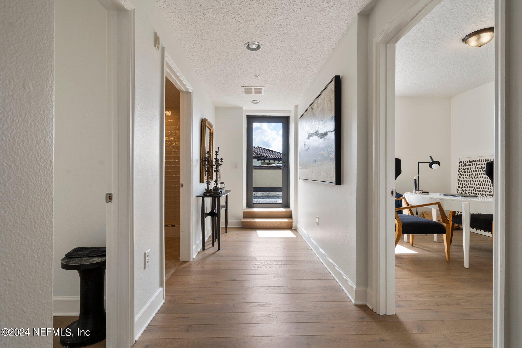 3958 Baymeadows Road, Unit 1602 Jacksonville, FL 32217 - Photo 50 of 91 Hallway-Bedrooms-Terrace Balcony