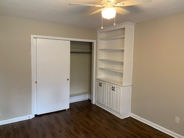 9050 Warm Springs Road Midland, GA 31820 - Photo 11 of 13 a view of empty room with wooden floor and fan