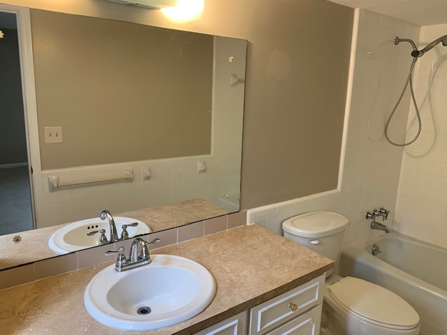 9050 Warm Springs Road Midland, GA 31820 - Photo 13 of 13 a bathroom with a sink a toilet and shower
