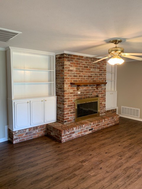 9050 Warm Springs Road Midland, GA 31820 - Photo 6 of 13 a view of fireplace and wooden floor